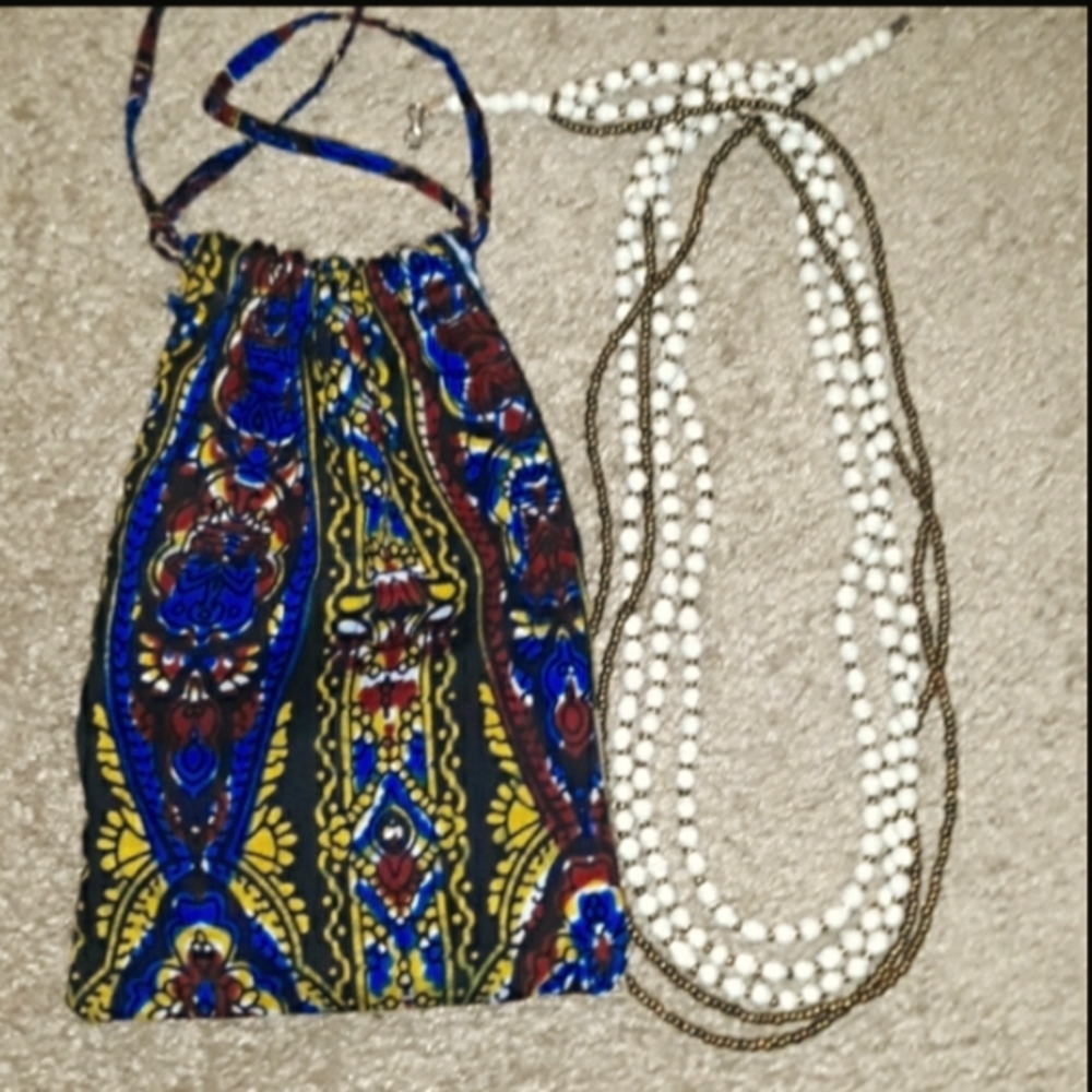 Ugandian Beaded Necklace..27inchs..cream/ brass